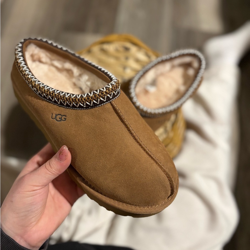 UGG Tan Slippers with Cream Lining.